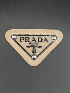 Cream Prada Triangle Patch/Croc Charm
